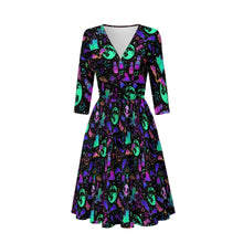 Load image into Gallery viewer, A three-quarter sleeve V-neck dress with a flared skirt, featuring a vibrant neon pattern of skulls, moons, and occult symbols on a black background.
